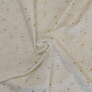 Plátno hvězdička zlatá 1 cm na bílé nepravidelná